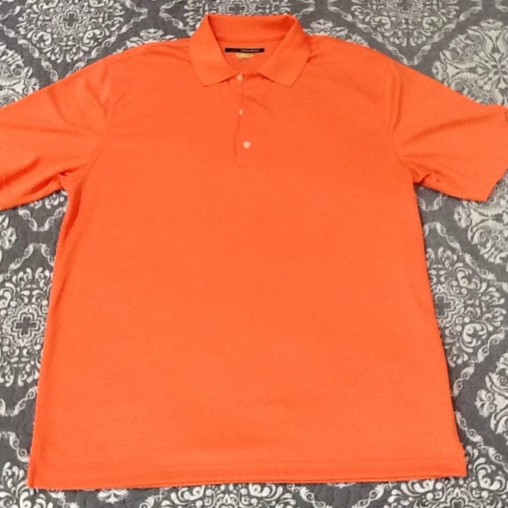 Greg Norman men's coral polo size L. EUC